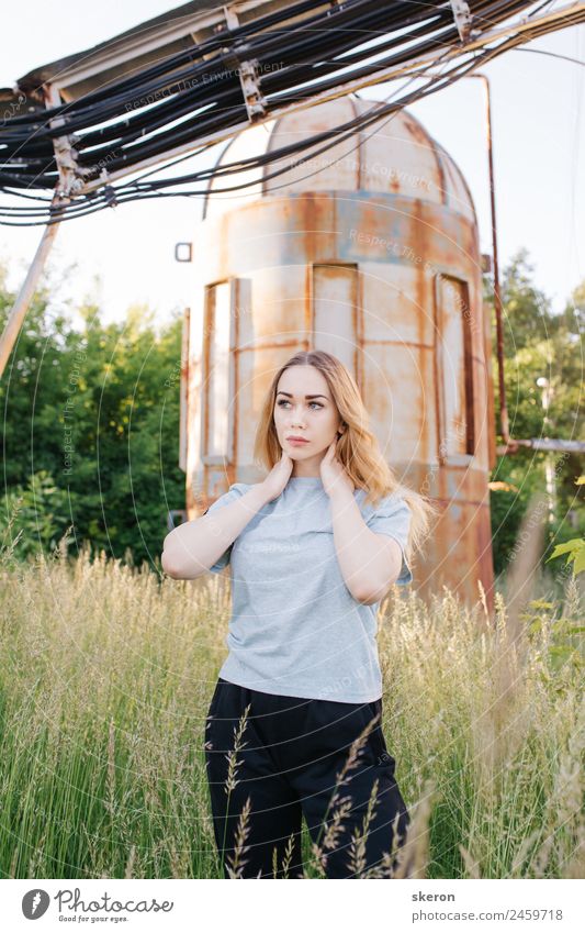 young girl standing near old building with wires Lifestyle Leisure and hobbies Feminine Woman Adults Youth (Young adults) Hair and hairstyles Arm 1 Human being