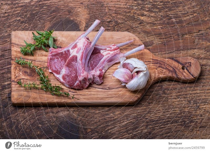 raw lamb chops Food Meat Herbs and spices Wood Good Rosemary Bone Ribs Steak Chopping board Kitchen Healthy organic meat Thyme Mediterranean Lamb Raw Lamb chop