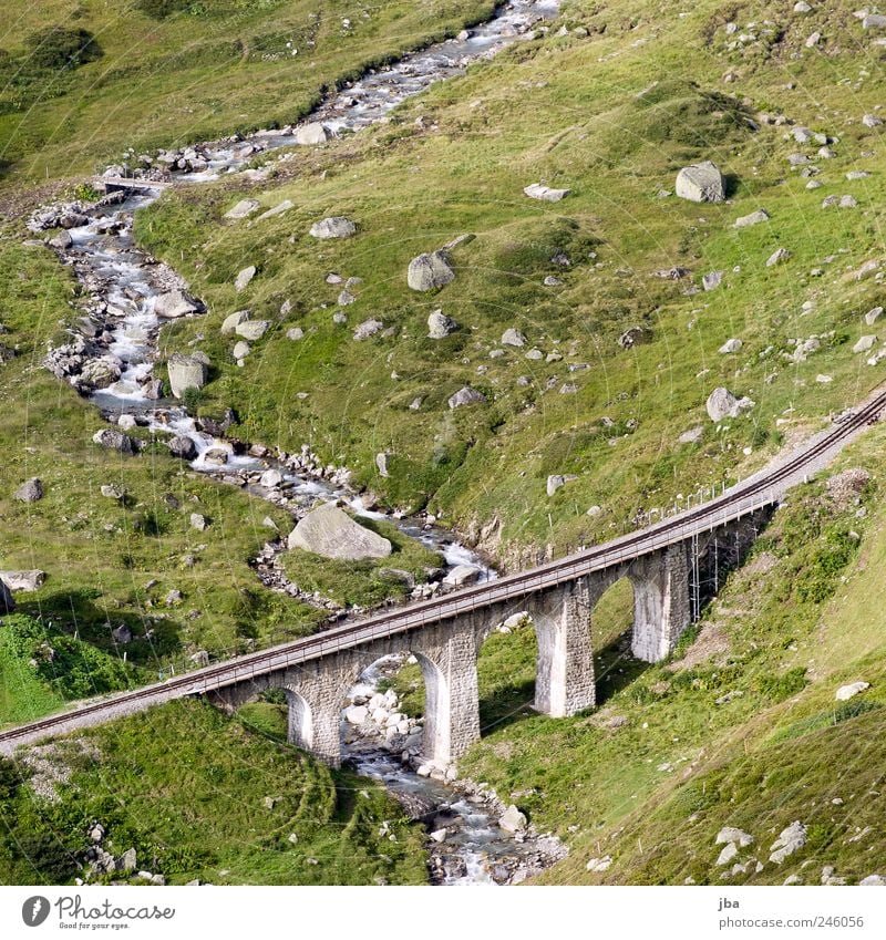 bridge Mountain Hiking Nature Summer Rock Alps Brook Mountain stream Furka Pass Switzerland Bridge Rail transport Train travel Stone Authentic viaduct