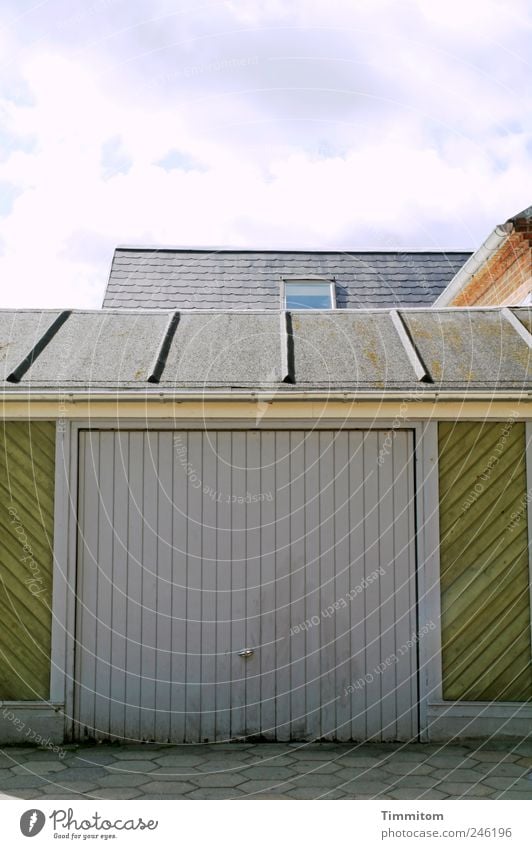 "Yeah, yeah, it's all right..." Living or residing Garage Garage door Clouds Denmark Small Town Deserted House (Residential Structure) Roof Wood Broken Gray