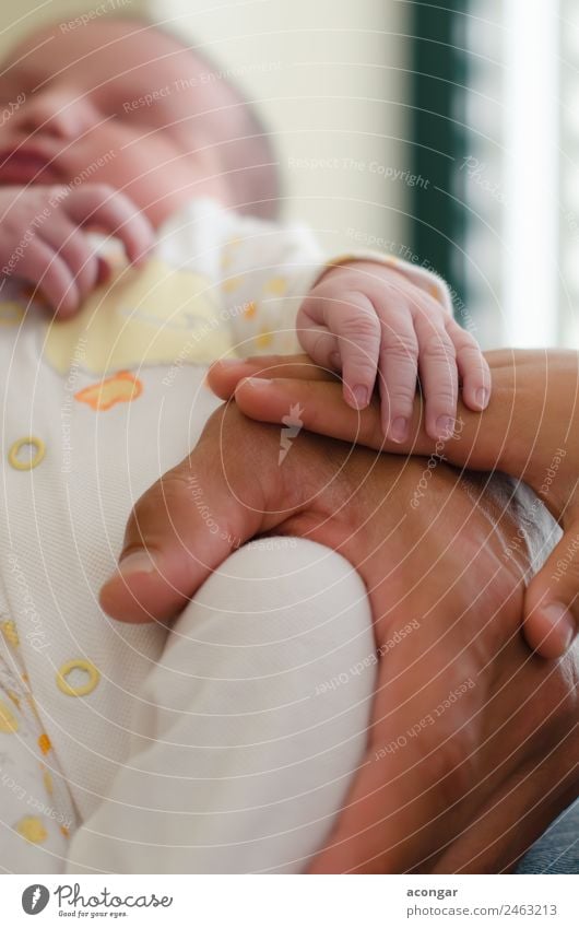 Hands of dad, brother and little newborn. Lifestyle Child Human being Masculine Baby Man Adults Father Family & Relations 1 0 - 12 months Emotions Safety