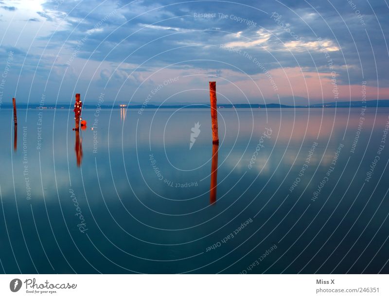 footbridge Vacation & Travel Far-off places Summer Summer vacation Ocean Water Clouds Coast Island Lake Navigation Blue Moody Horizon Jetty Wooden stake