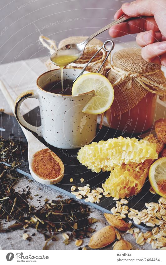 Natural medicine against common cold Food Lemon Honey Honeycomb Cinnamon Oats Almond Nutrition Breakfast Organic produce Vegetarian diet Beverage Hot drink Tea