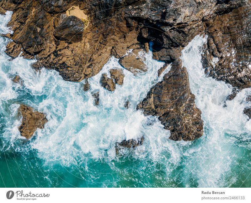 Aerial Drone View Of Dramatic Ocean Waves Crushing On Rocky Landscape Movement slow Aircraft rock beach Beach Abstract Vantage point Top Water Nature Beautiful