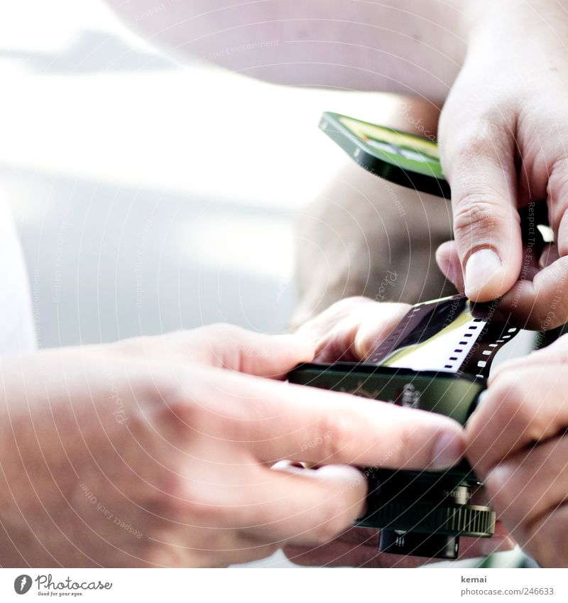 faux pas movie insert film Camera Masculine Hand Fingers 2 Human being Green Analog Extract pot Colour photo Subdued colour Close-up Detail Day Light Contrast