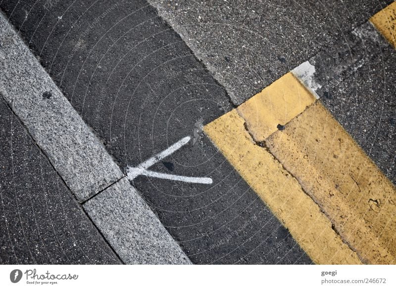 transitions Transport Traffic infrastructure Street Zebra crossing Pavement Asphalt Curbside Sign Road sign Line Arrow Old Yellow Gray White Chaos Change