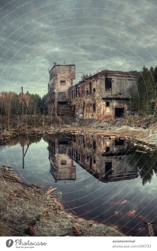 Old industrial building Industry Water Clouds Bad weather Storm Tree Industrial plant Factory Architecture Brick Poverty Dirty Dark Cheap Gray Sadness