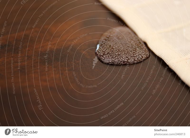 Aqua con gas Drinking water Table Drops of water Wet Happy Mineral water Bubble Contrast Wooden table Colour photo Close-up Tablecloth