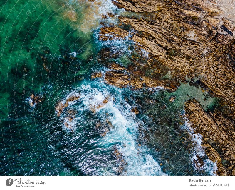 Aerial Drone View Of Dramatic Ocean Waves Crushing On Rocky Landscape Movement slow Aircraft rock beach Beach Abstract Vantage point Top Water Nature Beautiful