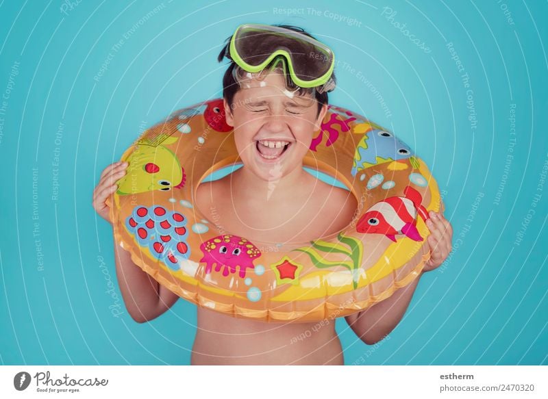 happy child smiling with float ring Lifestyle Joy Swimming pool Leisure and hobbies Vacation & Travel Trip Summer Sun Beach Ocean Sports Dive Human being