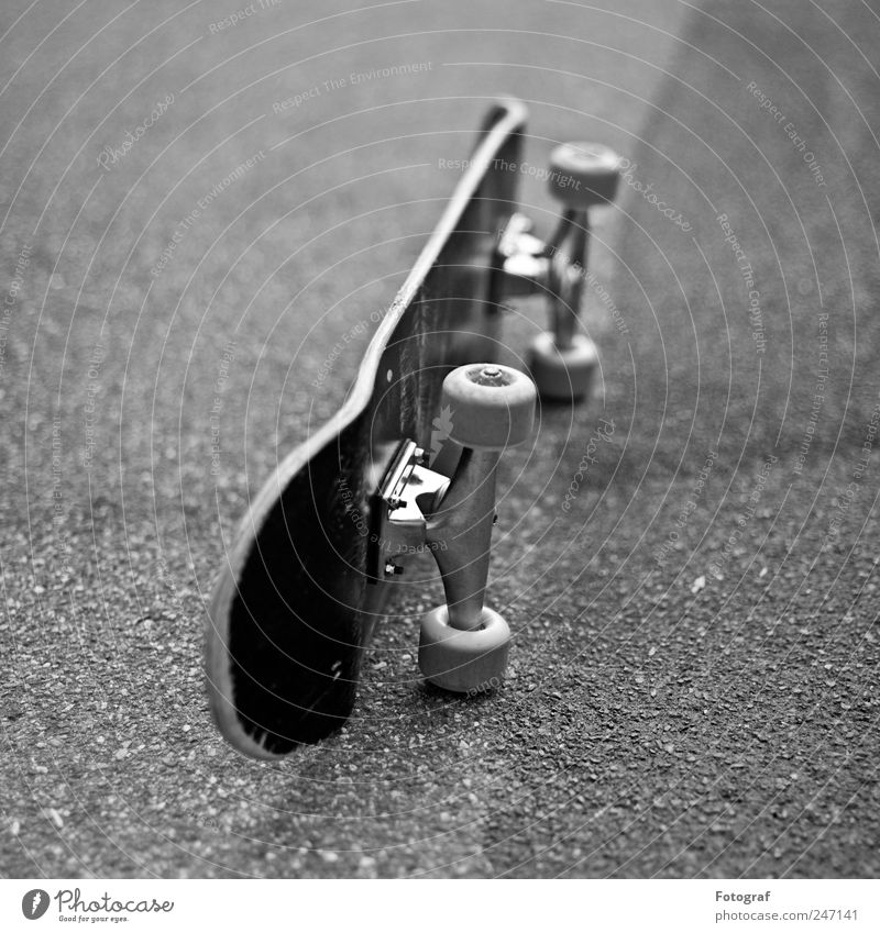 skateboard Skateboard Street Lanes & trails Black Skateboarding Coil Axle Asphalt Aluminium Black & white photo Exterior shot Deserted Shallow depth of field