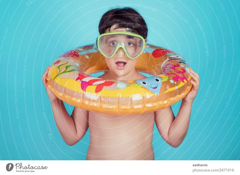 happy child smiling with float ring Lifestyle Joy Swimming pool Vacation & Travel Trip Summer Sun Beach Ocean Sports Dive Human being Child Toddler Infancy 1