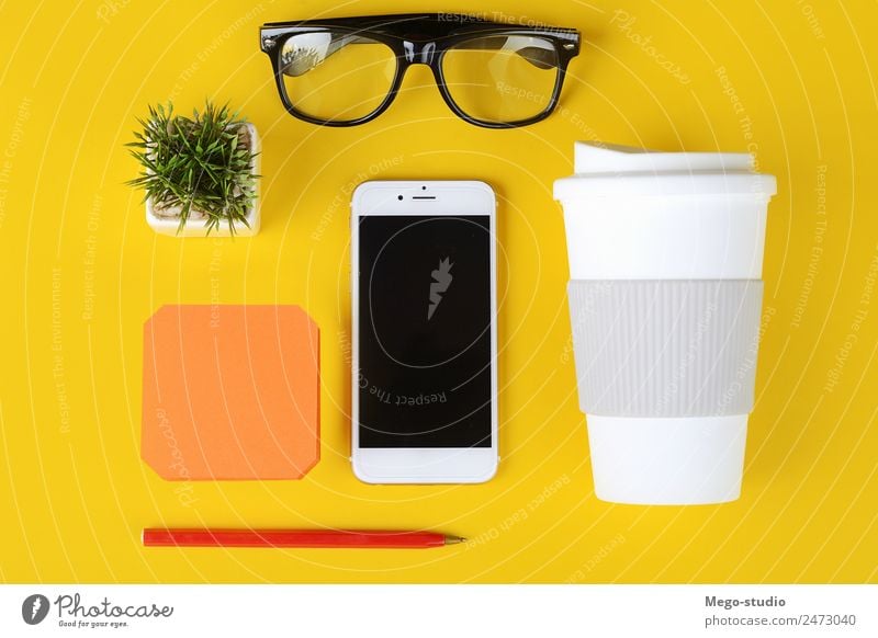 Business objects, cup of coffee, pen, phone and glasses. Coffee Desk Table School Work and employment Workplace Office Telephone Cellphone PDA Technology Book