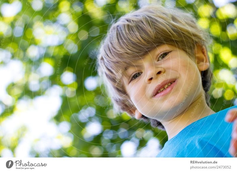 Child smiles in the green Human being Boy (child) Infancy Body Face 1 3 - 8 years Environment Nature spring Summer tree Forest Authentic Happiness luck Small