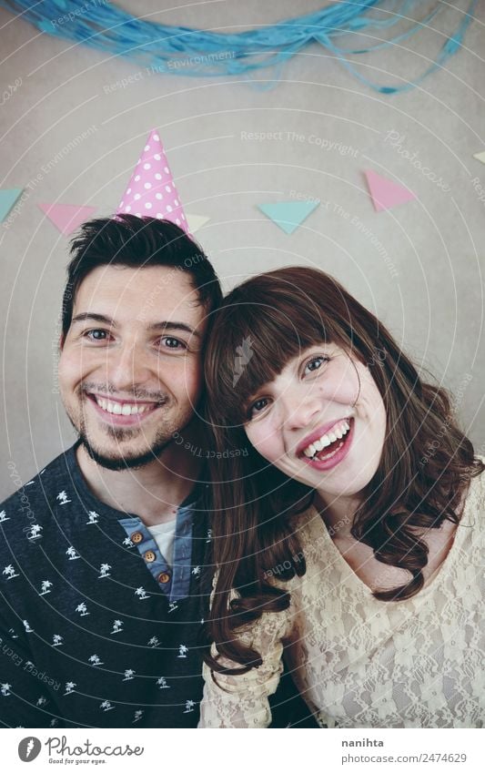 Young happy couple celebrating a birthday party Lifestyle Joy Wellness Well-being Party Event Feasts & Celebrations Birthday Human being Masculine Feminine