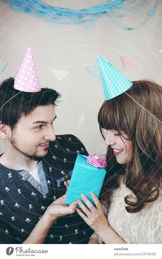 Young couple celebrating a birthday Lifestyle Party Feasts & Celebrations Valentine's Day Wedding Birthday Human being Masculine Feminine Young woman