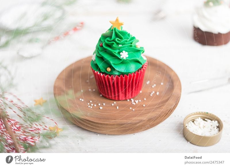 Cupcake christmas tree Dessert Winter Decoration Feasts & Celebrations Christmas & Advent Tree Bright Green White Colour Baking cream Festive food Frost Icing