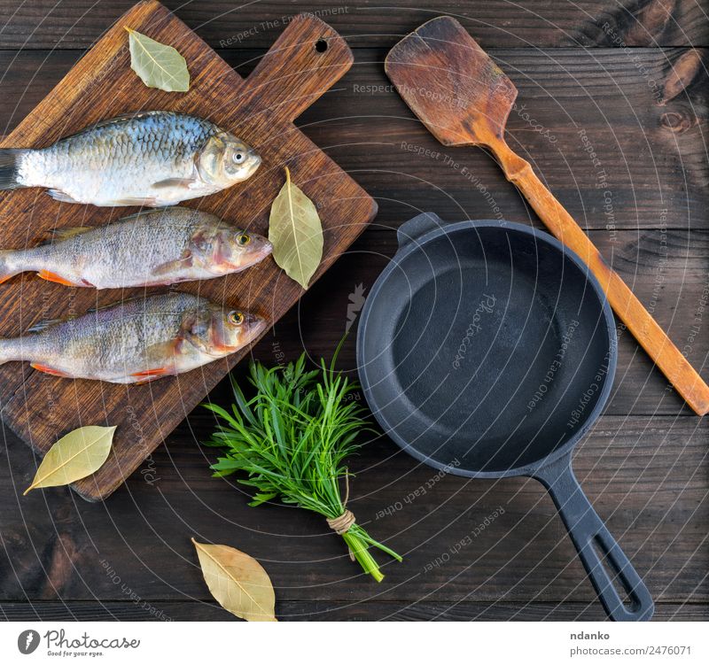 Purified river fish from the scales Fish Seafood Herbs and spices Nutrition Dinner Diet Pan Table Animal River Wood Fresh Above Retro Brown Black Perches