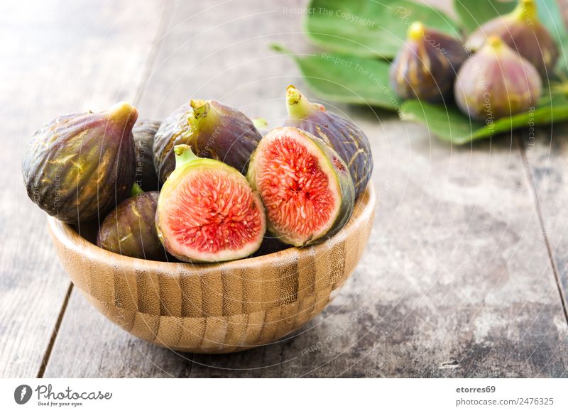 Fresh figs on wooden background Fig Fruit Food Healthy Eating Food photograph antioxidant Raw Sweet Tropical Vitamin White Wood