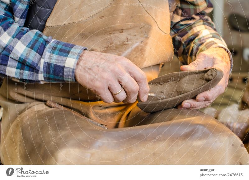 Old hands of a potter shaping a clay figure Design Handicraft Work and employment Profession Craftsperson Tool Art Artist Disciplined ceramic Clay crafts