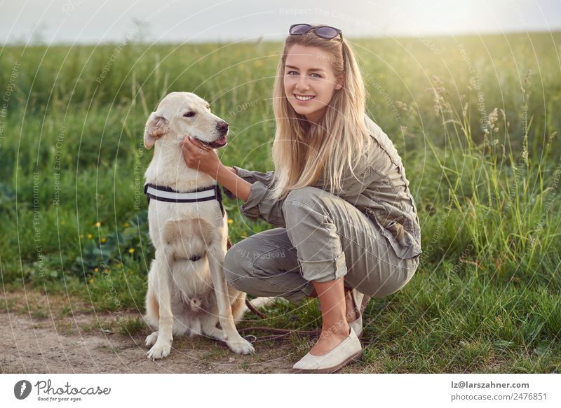 Happy smiling dog with its pretty young owner Lifestyle Joy Beautiful Leisure and hobbies Playing Summer Woman Adults Friendship 1 Human being 18 - 30 years