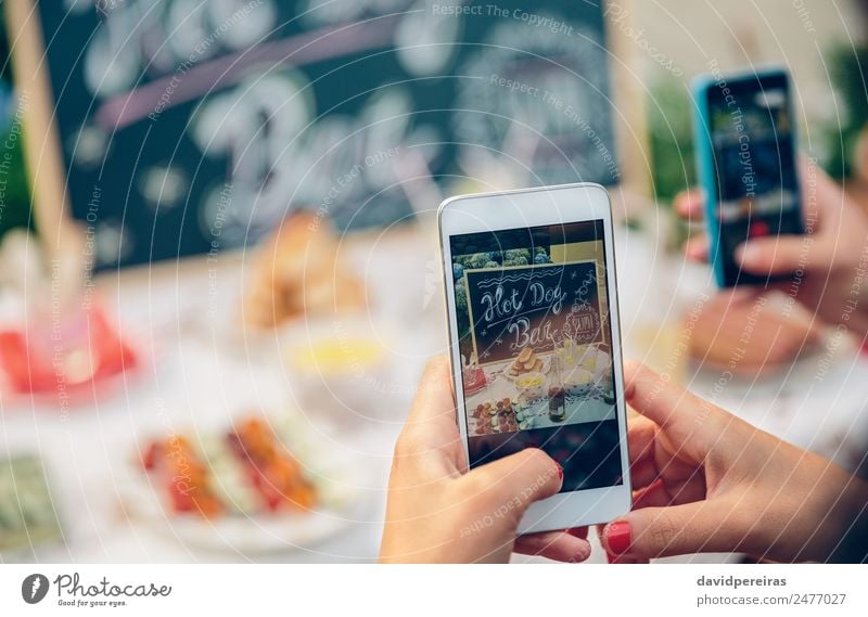 Woman hands taking photo to table with food Bread Fast food Lemonade Alcoholic drinks Beer Plate Lifestyle Joy Leisure and hobbies Summer Table Blackboard