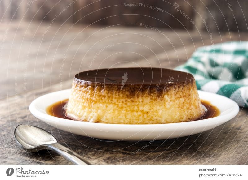 Creme caramel. Egg pudding on wooden background Cream Caramel Pudding French Dessert Vanilla custard Sweet Candy flan Delicious Sugar Wood