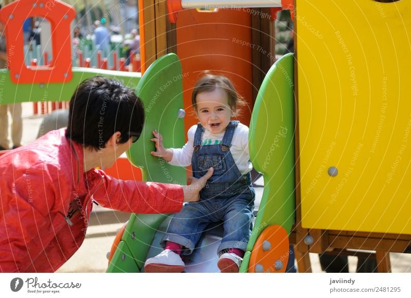 Little girl playing in a urban playground. Lifestyle Joy Happy Beautiful Leisure and hobbies Playing Summer Climbing Mountaineering Child Human being Baby Girl