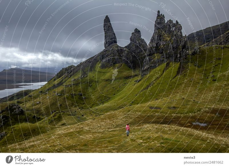 Old Man of Storr on the Isle of Skye in Scotland Landscape Clouds Storm clouds Climate Bad weather Wind Grass Hill Rock Mountain Peak Exceptional Dirty