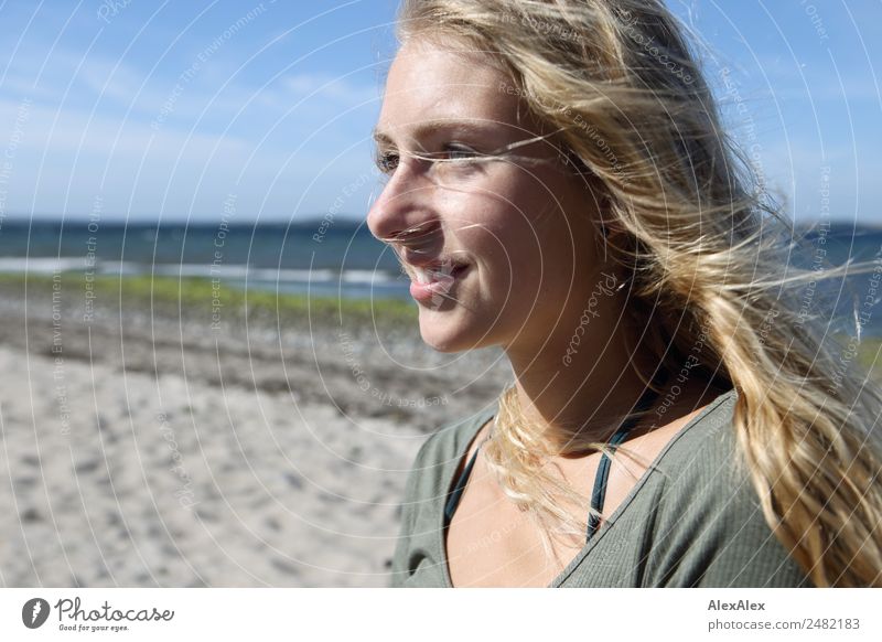 Portrait of a young woman on the beach Joy pretty Well-being Summer Summer vacation Sun Young woman Youth (Young adults) Face 18 - 30 years Adults Landscape