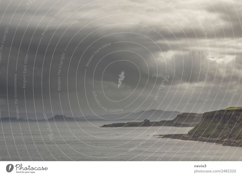 Dark rain clouds on the coast of the Isle of Skye in Scotland Water Storm clouds Bad weather Gale Rain Waves Coast Beach Bay Infinity Wet Black Wanderlust