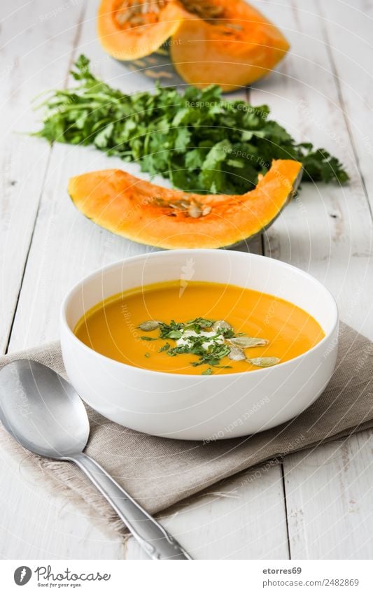 Pumpkin soup Food Vegetable Nutrition Lunch Vegetarian diet Bowl Thanksgiving Fresh Healthy Good Orange Healthy Eating Seed Vegan diet Parsley Spoon