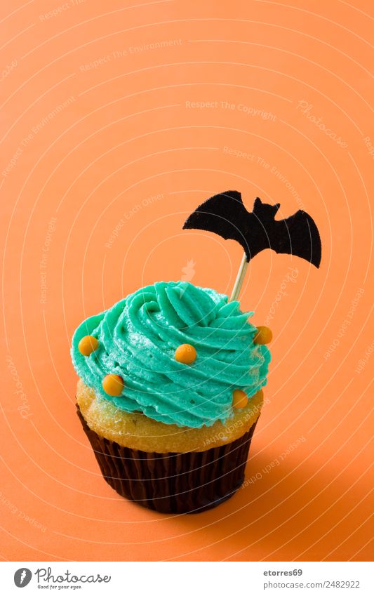 Halloween cupcake Food Cake Dessert Candy Hallowe'en Good Sweet Yellow Green Orange Black Cupcake Funny Bat Fear Butter Baked goods Child Cream Copy Space top