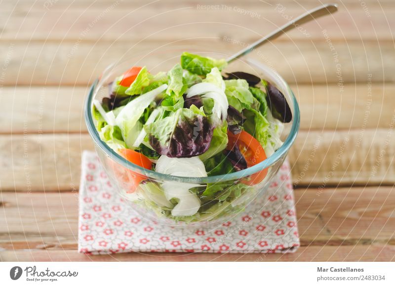 Salad bowl on rustic wooden background Vegetable Lettuce Nutrition Eating Breakfast Lunch Dinner Vegetarian diet Diet Plate Bowl Healthy Summer Restaurant