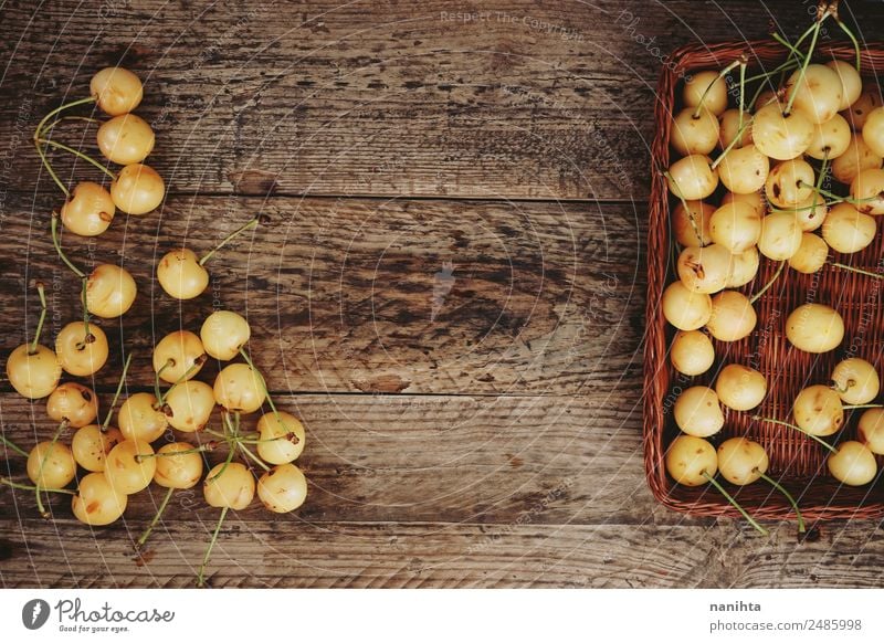 White cherries against wooden background Food Fruit Dessert Cherry Nutrition Organic produce Vegetarian diet Diet Wood Authentic Fresh Healthy Cheap Good