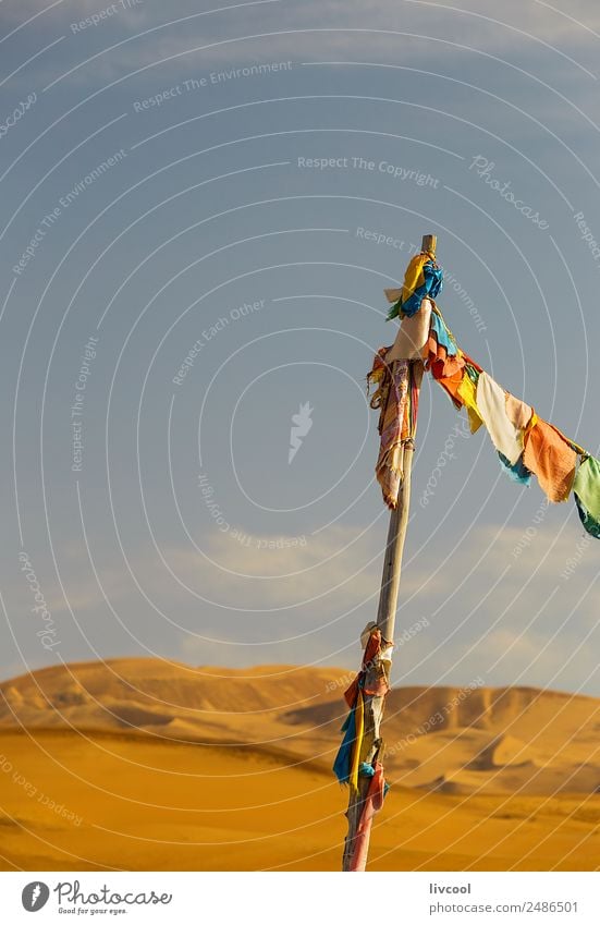 buddhist banners on lake badain miao, china Culture Landscape Sky Clouds Autumn Wind Hill Lake Desert Places Building Decoration Sand Flag Infinity Natural Dry