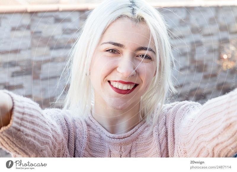 Woman in pink sweater making selfie Lifestyle Style Joy Happy Beautiful Face Relaxation Leisure and hobbies Vacation & Travel Trip Summer Sun Human being