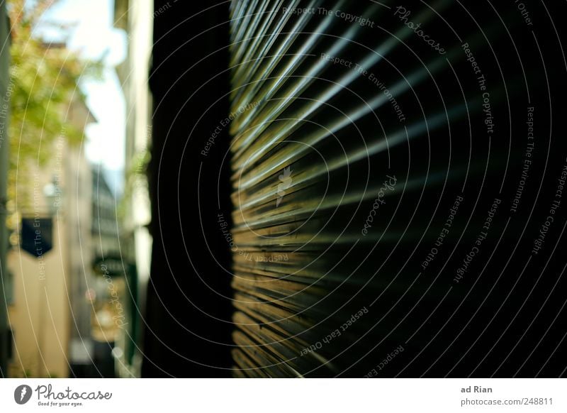 Light into the darkness Downtown Deserted Wall (barrier) Wall (building) Facade Alley Bright Symmetry Colour photo Exterior shot Day Sunbeam Long shot