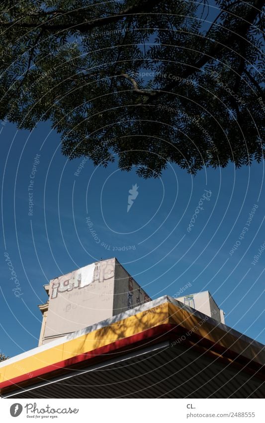 filling station in kreuzberg Cloudless sky Summer Beautiful weather Tree Berlin Kreuzberg Capital city Deserted House (Residential Structure) High-rise