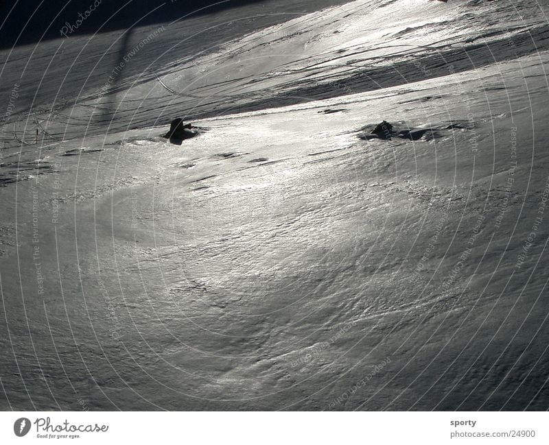 icy lustre Winter Mountain Snow Ice Ski run Skiing Snow layer Black & white photo Copy Space bottom