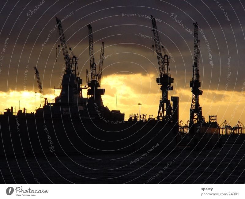 harbor Clouds Crane Ocean Physics Dark Sunrise Sunset Electrical equipment Technology Hamburg Harbour Sky ski Water