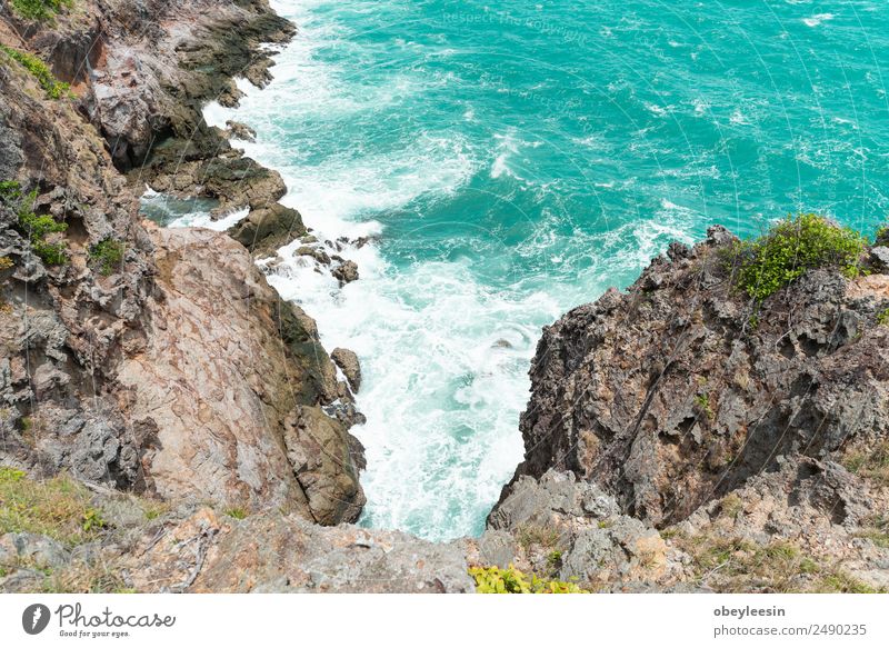 Sea waves breaking against cliff viewed from above. Beautiful Vacation & Travel Ocean Island Wallpaper Landscape Sand Storm Park Rock Coast Aircraft Stone Dark