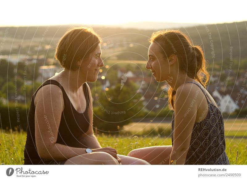 2 young women sitting opposite each other Youth (Young adults) Human being Adults Leisure and hobbies Nature Landscape Sister Friendship Summer 18 - 30 years