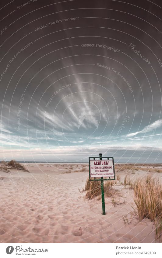 Spiekeroog. Attention. Ocean Beach Signs and labeling Sky Sand