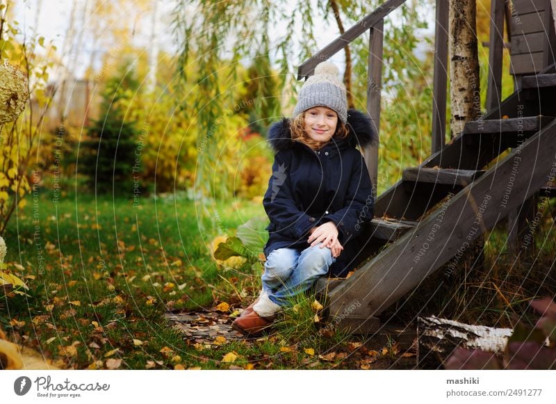 autumn portrait of happy kid girl sitting in garden Lifestyle House (Residential Structure) Garden Child Nature Autumn Warmth Grass Leaf Wood Smiling Sit Wild