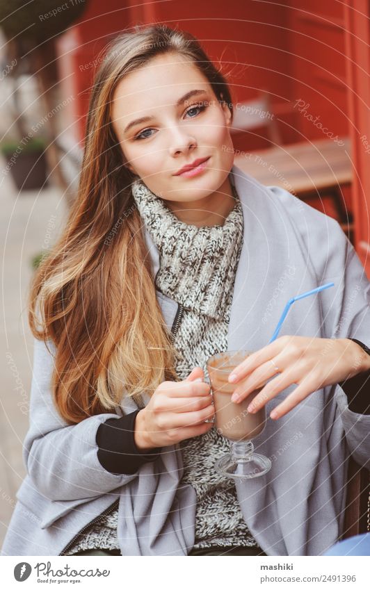 pretty young woman drinking coffee outdoor in cafe Young woman Youth (Young adults) Woman Adults 18 - 30 years Blonde Coffee Drinking Café Walking Seasons