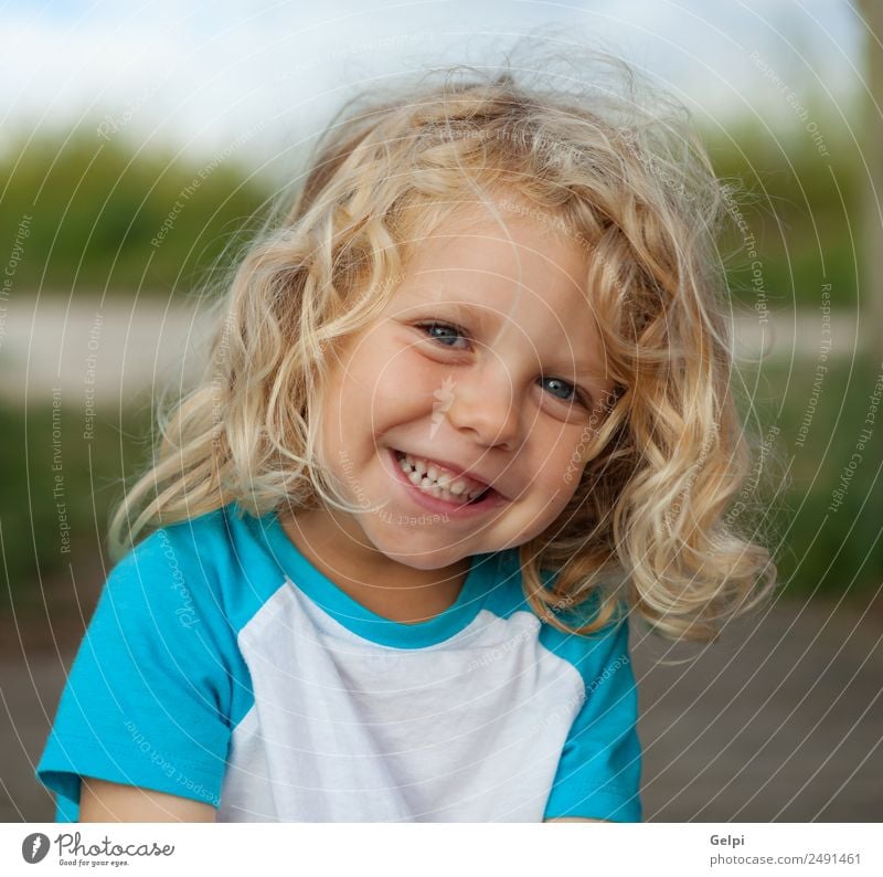 Small child with long blond hair enjoying of a sunny day Happy Beautiful Face Summer Child Human being Baby Boy (child) Man Adults Infancy Environment Nature