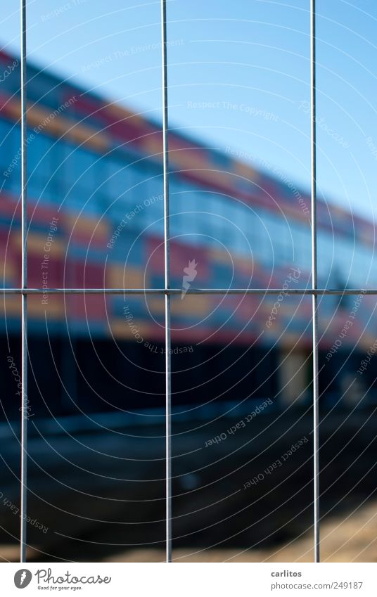 behind bars Cloudless sky Beautiful weather Building Facade Window Art Grating Barrier Exclude Captured Cladding Grid At right angles Blur Bank building