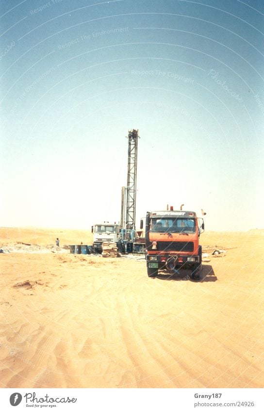 Finding cold clear water Well Drill Arabia Asia Hot Advertising executive Poster Panorama (View) Vacation & Travel Science & Research GTZ Water Desert Sand