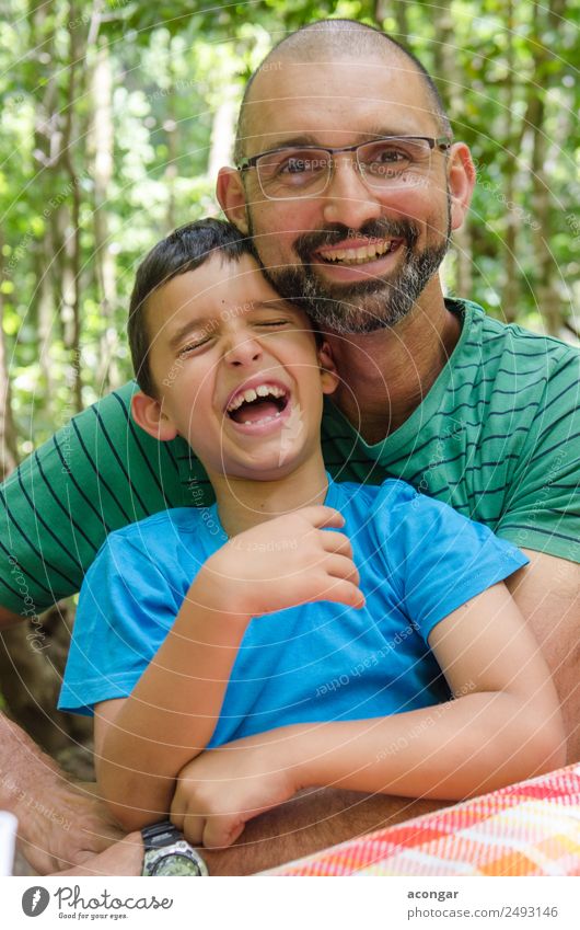 Father making his son laugh Lifestyle Human being Child Boy (child) Man Adults Family & Relations 2 3 - 8 years Infancy 30 - 45 years Smiling Laughter Playing